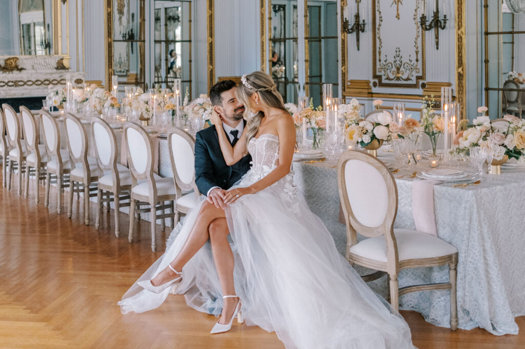 Elkins Estate wedding couple cuddling in ballroom