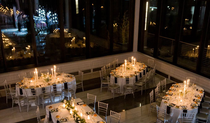 by Landmark Hudson House interior ballroom at night