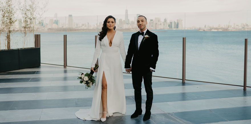 Hudson House Wedding couple on rooftop at sunset